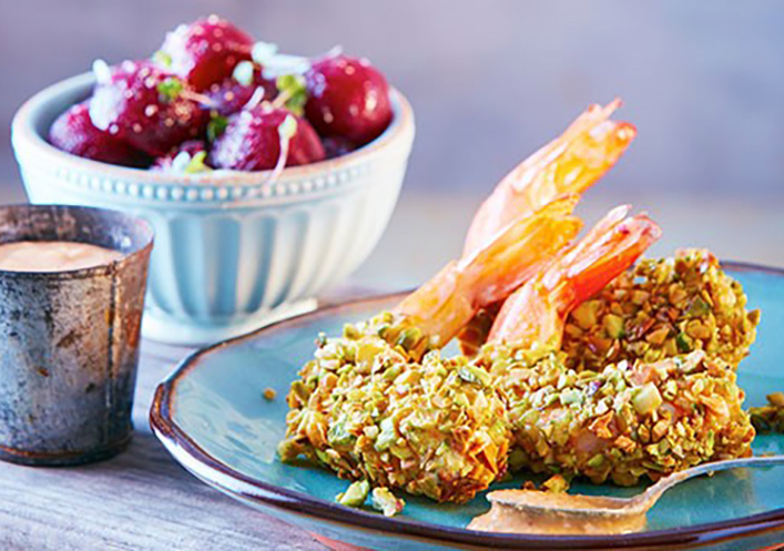 Gambas con pistacho y salsa de coco